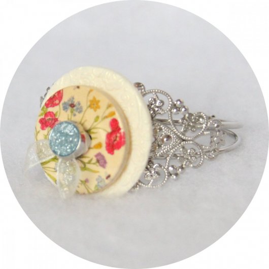 Bracelet rigide boutons fleurs et argent
